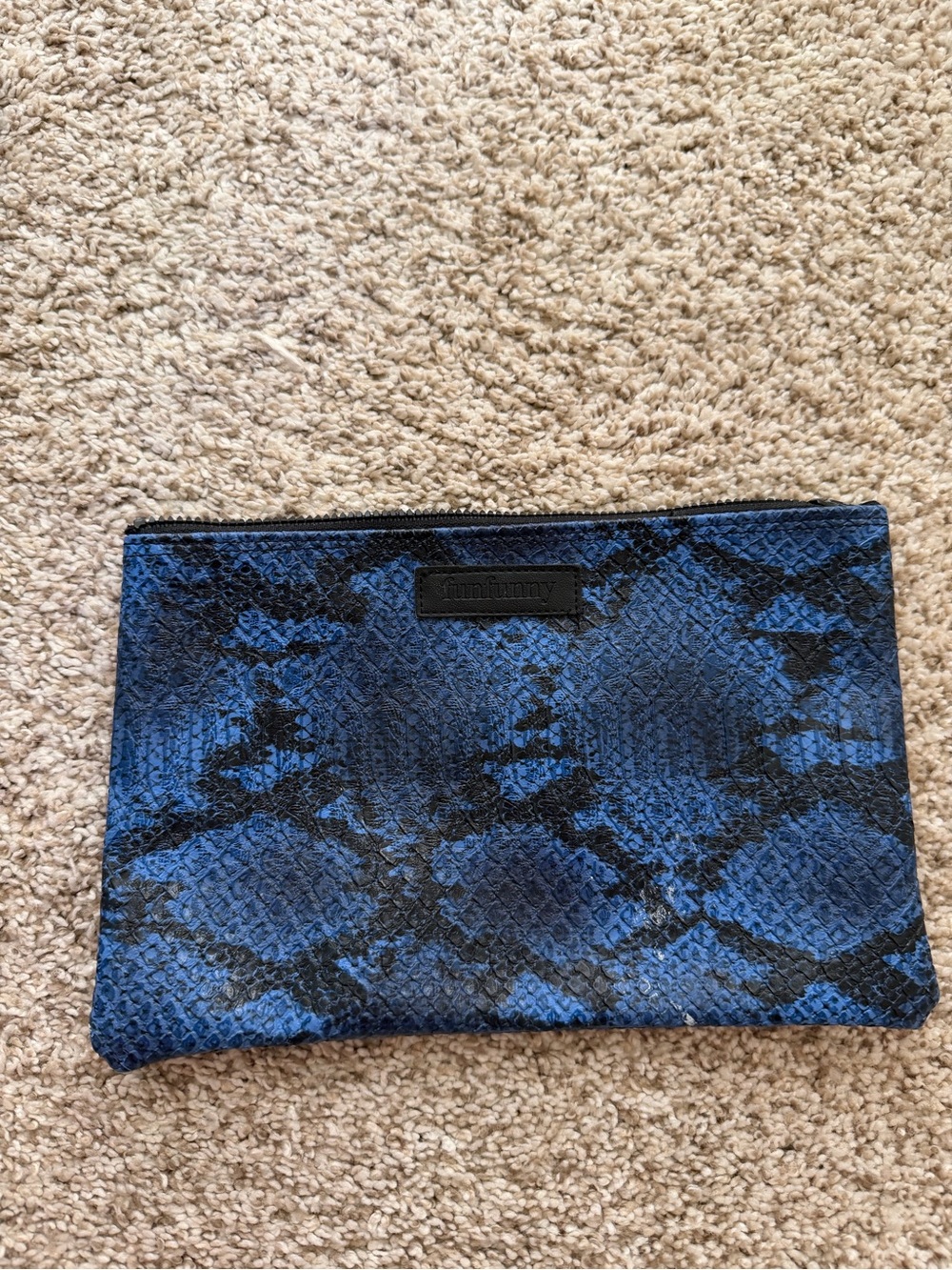 Blue snake-style handbag
